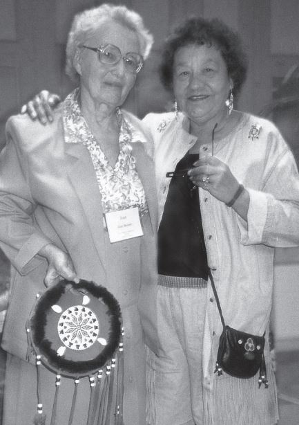 To demonstrate the OHS’s appreciation for Jean Burnet’s many years of service, the late Mary Lou Fox (right) of the Ojibwe Cultural Foundation, Manitoulin Island and a former OHS Board Member, conducted a special eagle feather ceremony at the 1995 OHS Annual Conference in Chatham. Mary Lou also handcrafted a beautiful leather shield which she presented to Jean. Photo: Rob Leverty