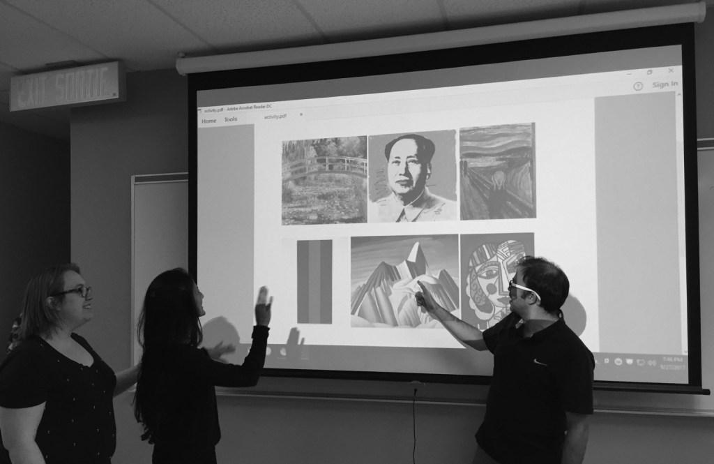 Students from the Algonquin College Museum Studies Program volunteer to describe art during John Rae's annual lecture.